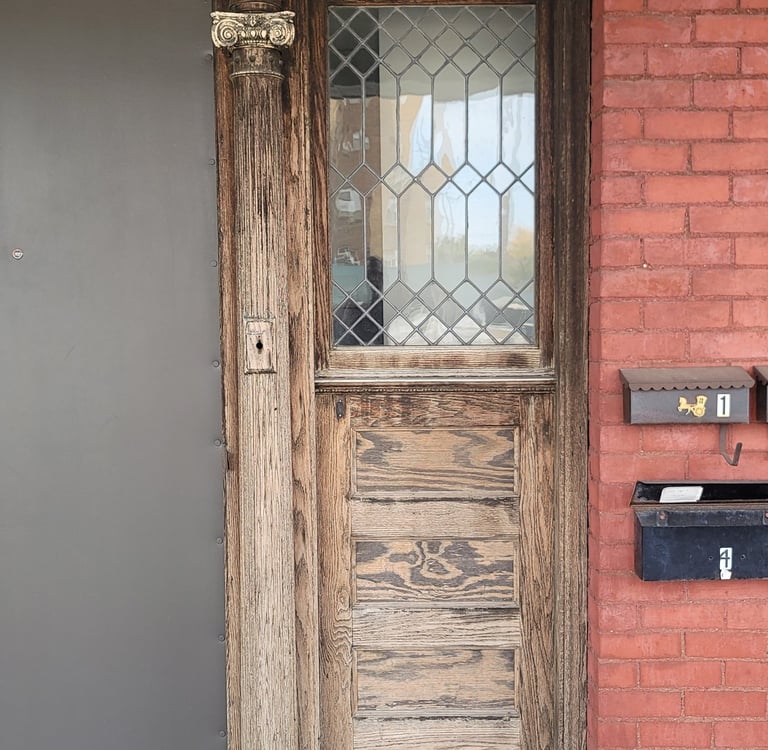 American Painting Specialist Fort Wayne, Indiana refreshing old wood doors to 'like new'.