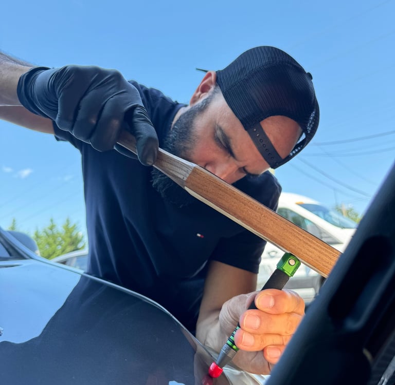 Our skilled technicians strive for customer satisfaction; Mrs. Sam expertly knocks the dent down.