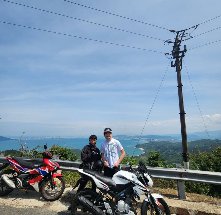 Pleasure customer on Hai Van pass motorbike tour in Da Nang.