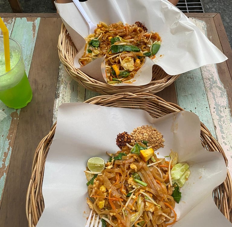 two baskets with food on a table
