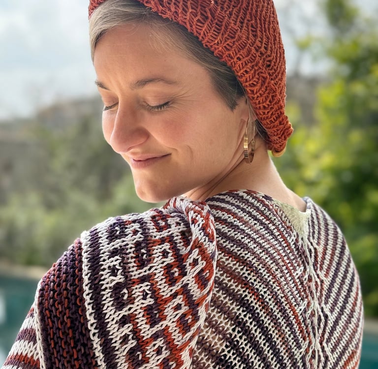 Sophie wearing her shawl in hand-dyed eco-friendly yarn