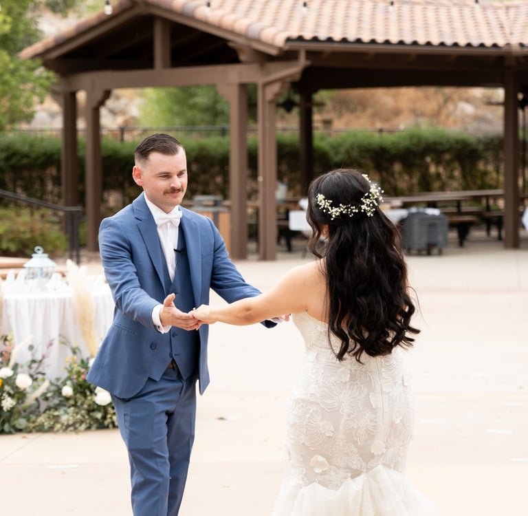 a bride and groom dancing at a wedding