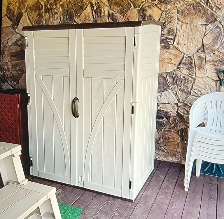 Storage shed assembled from a kit