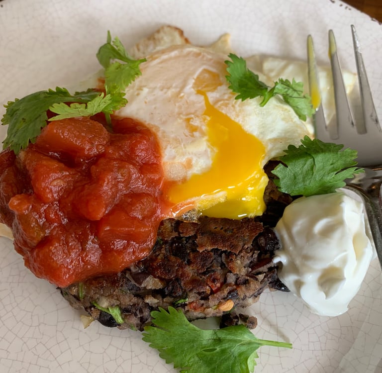 black bean burger with runny egg, salsa and cilantro
