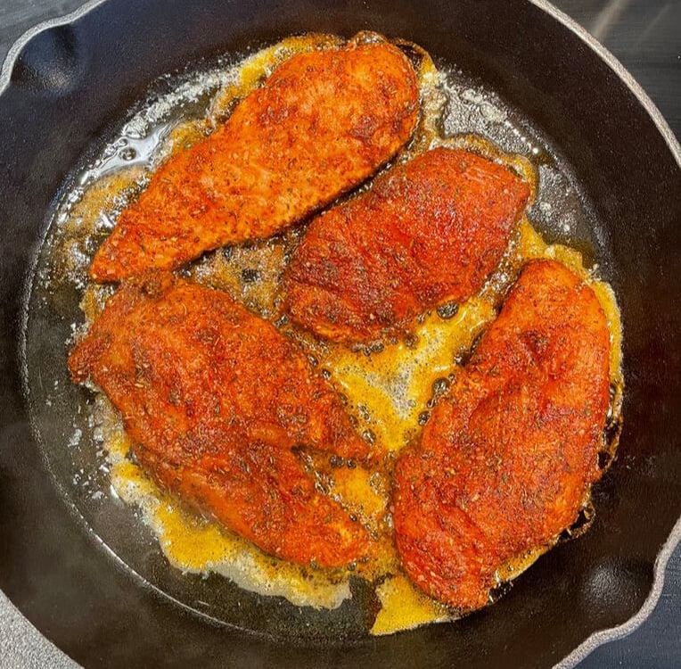 chicken with blackening spice cooking