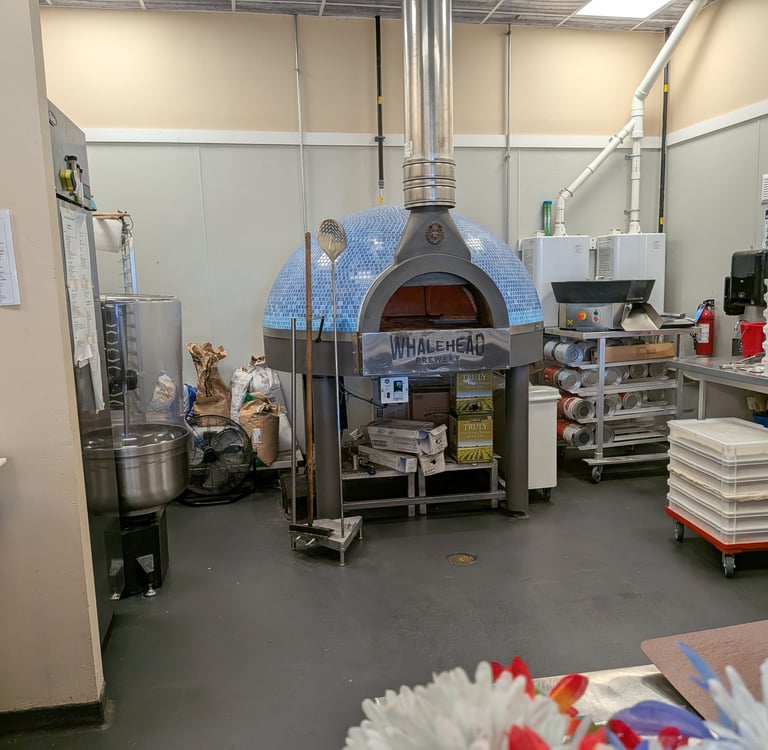 large wood pizza oven at whalehead brewery