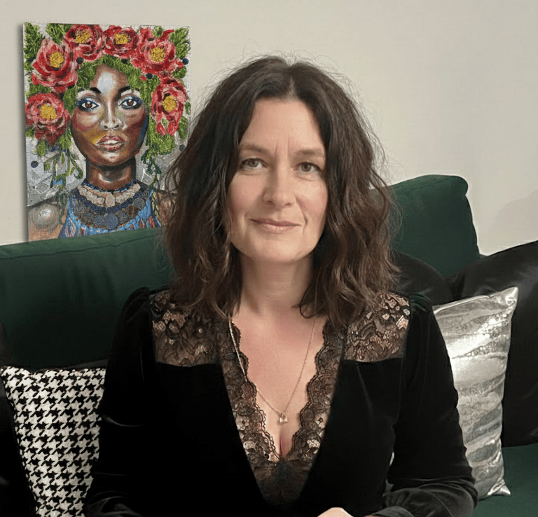 Xirkys sitting on a sofa, her vibrant work, the hybrid portrait "shade, the awakening of petals", be