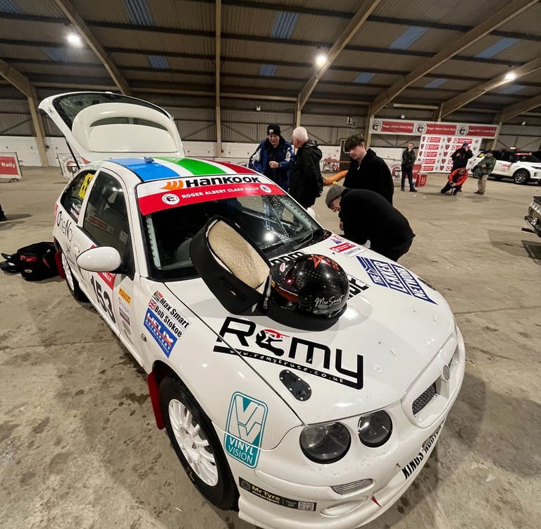 a rally car with a helmet on it