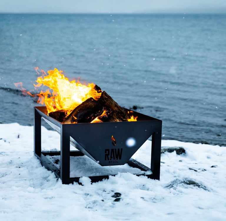 Rawsteelco firepit being used in the snow