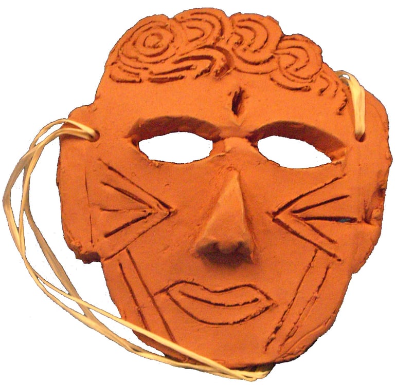 rolled clay made into a mask shape