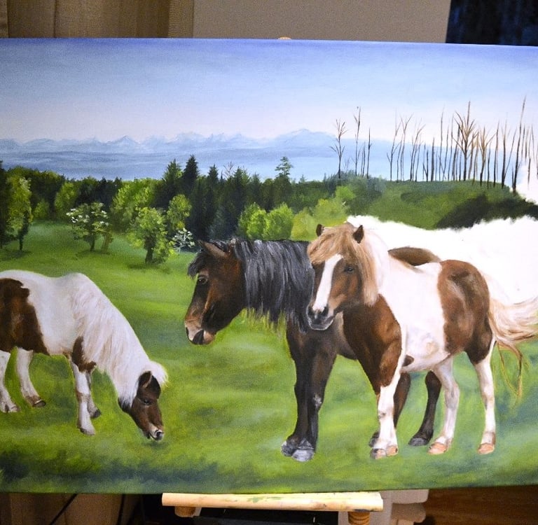 a painting of horses grazing in a field