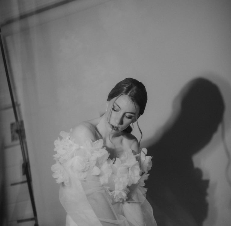 a woman in a white dress and a veil