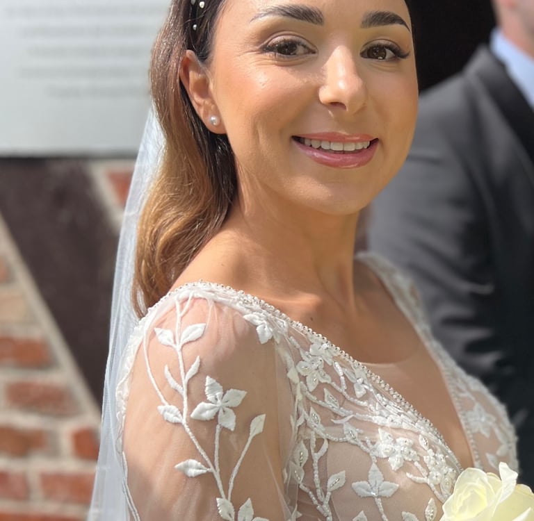 a woman in a wedding dress and a man in a suit