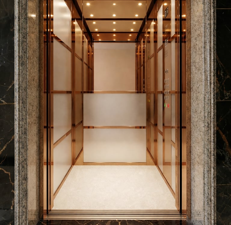 Luxury passenger elevator cabin with rose gold finish designed by Stellify Elevators
