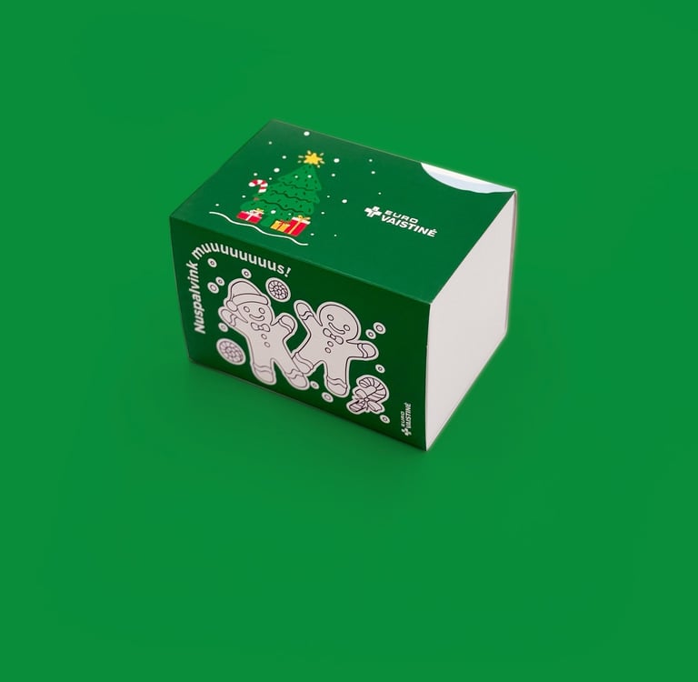 Custom green Eurovaistine pharmacy box with Christmas tree and gingerbread men illustrations.