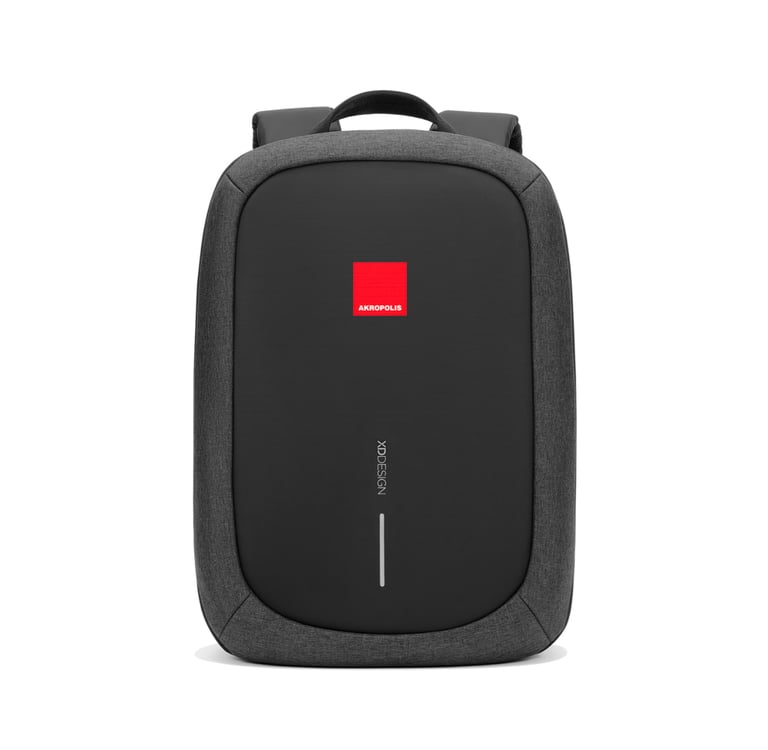Black XD Design anti-theft laptop backpack featuring a grey fabric trim and a red Akropolis logo.