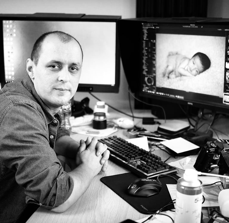 Constantin, the baby whisperer, aka the baby photographer