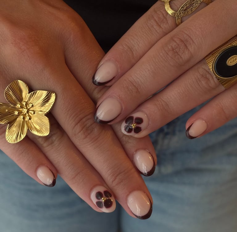 a woman's hands with rings and rings on her fingers