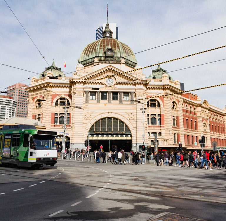 a bus is parked in front of a large building