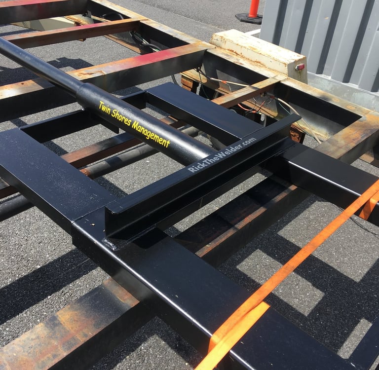 Custom fabbed forklift mounted carpet carrier attachment 