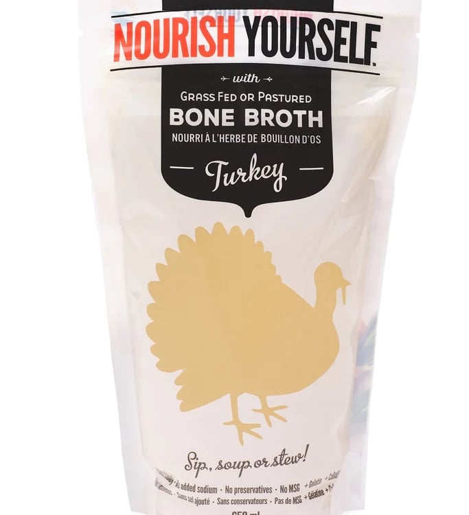 Nourish Yourself grass-fed turkey bone broth in a 650ml stand-up pouch for sipping, soups, or stews.