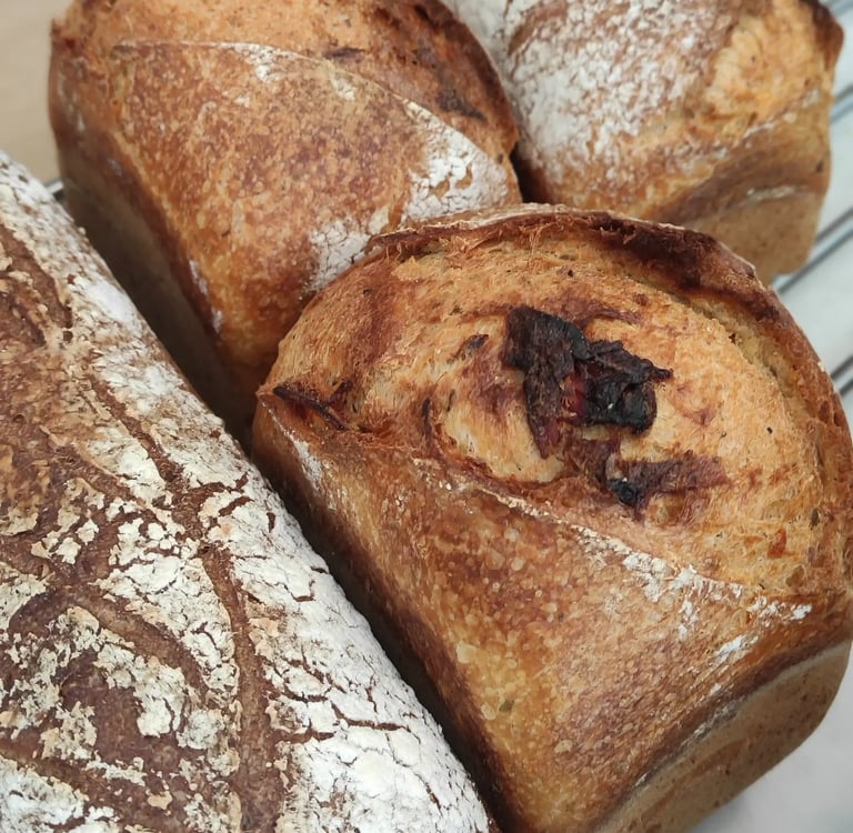 a bunch of breaded breaded breads on a cooling rack