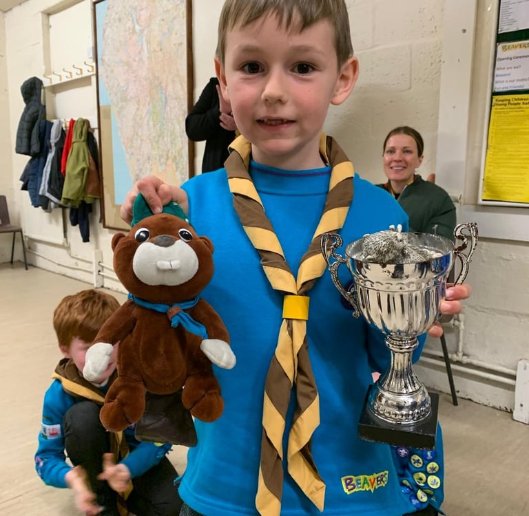A happy 25th Allerton Beaver holding a winning cup