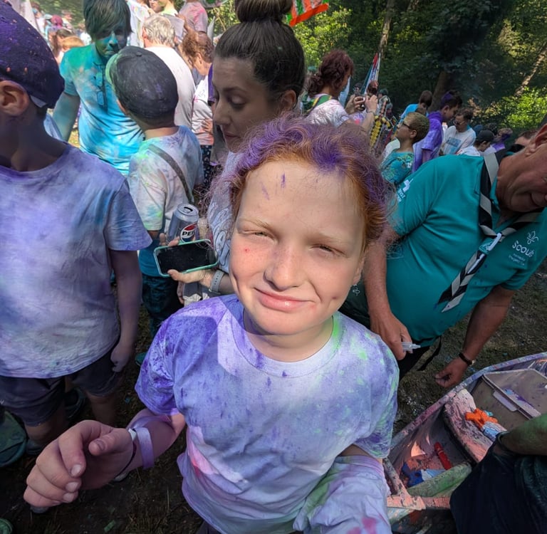 A young scout at a colour run