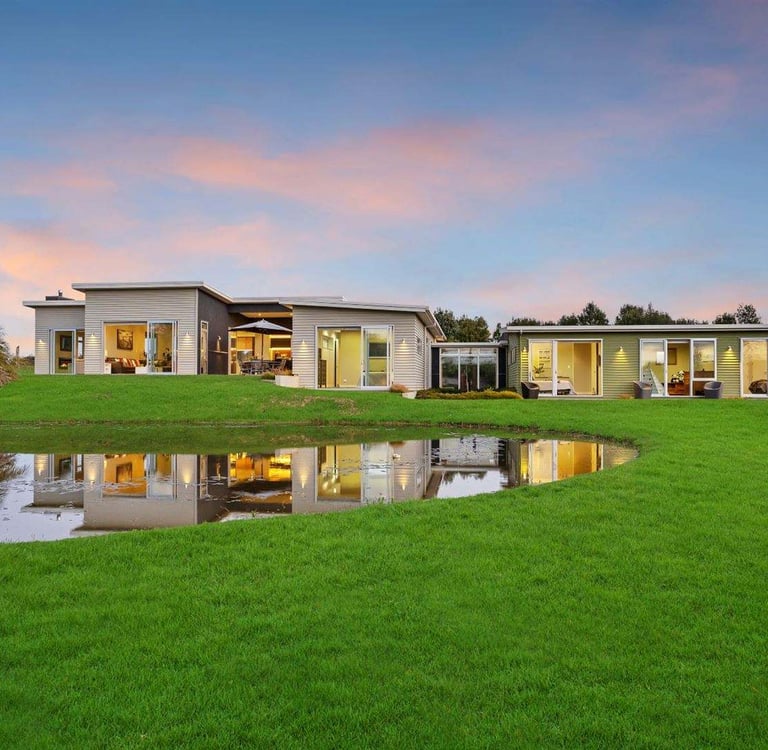 new addition countryside mono pitched weatherboard home, existing garage