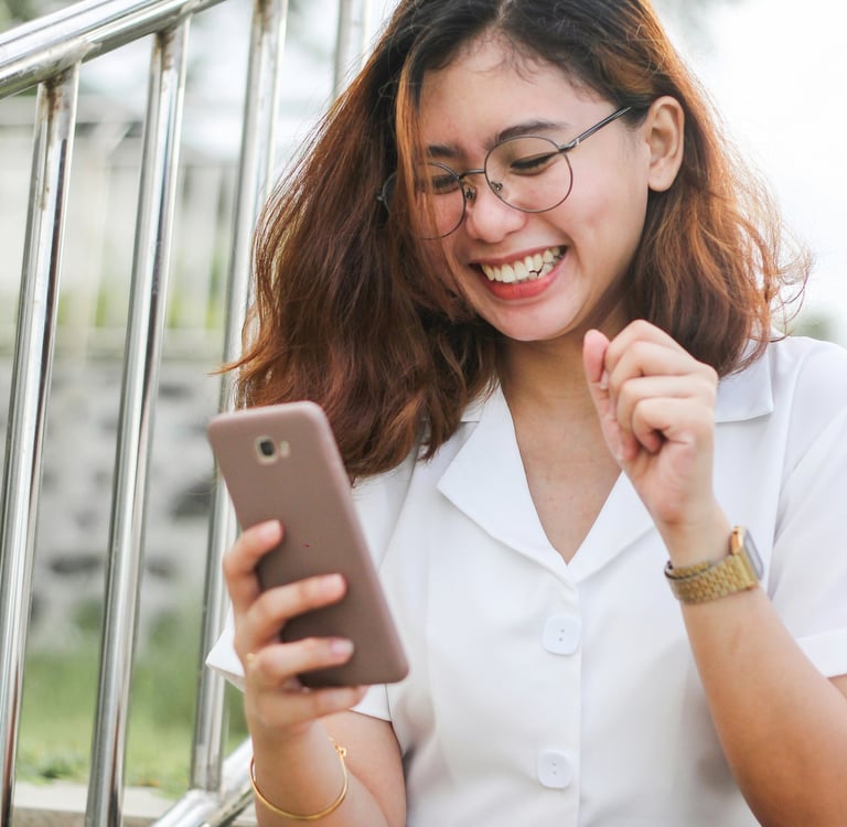 Woman flirting over text — playful texting tips to keep him interested