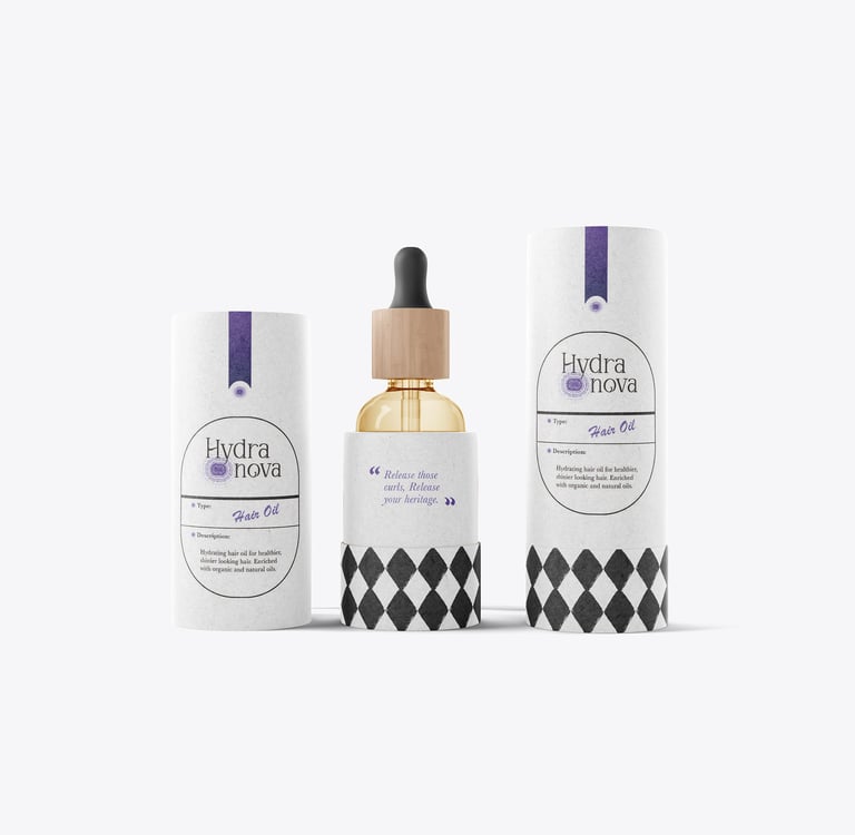 Hydra Nova hair oil glass dropper bottle with elegant white and black branded cardboard packaging.