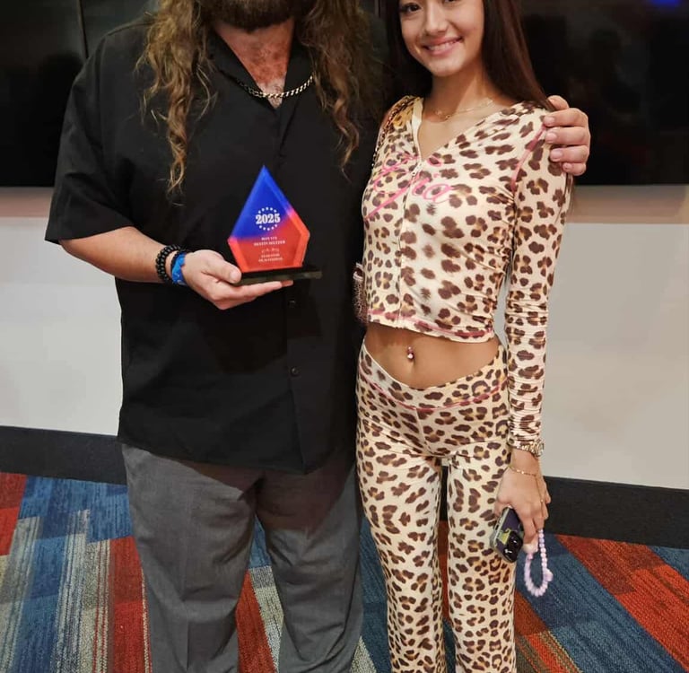 Award recipient recognized at a Fear Fame Arts Foundation supported event.