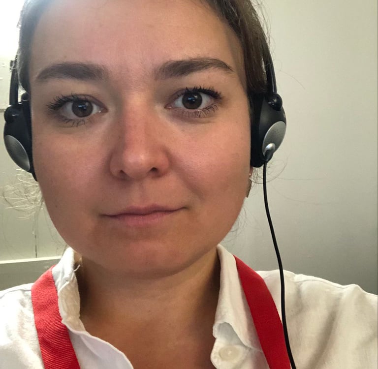 Russian simultaneous interpreter, conference interpreter in a Russian booth