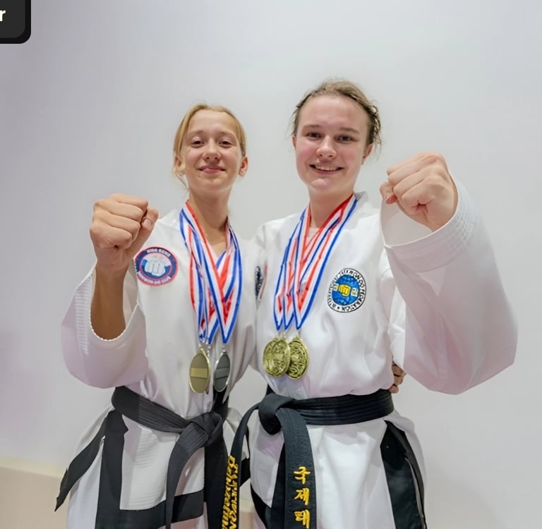 Hwa Rang Taekwon-Do students Dubai with competition medals showing courtesy and sportsmanship