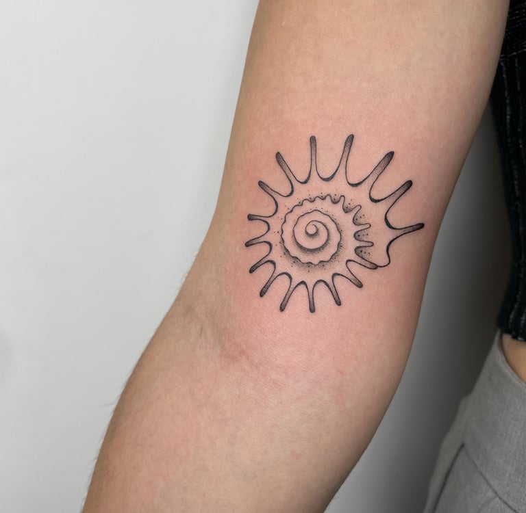 Tatouage de coquillage à Big Foot Bayonne