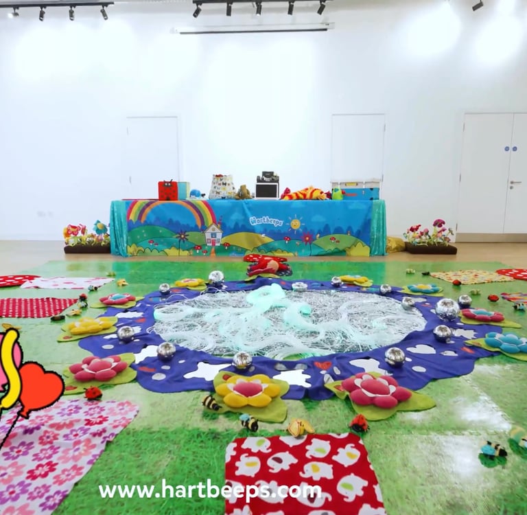 Hartbeeps sensory play setup with props and mats at Golden Acre Community Centre Saffron Walden