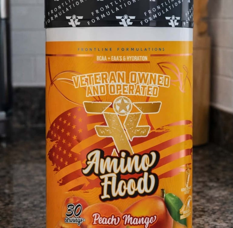 Amino Flood BCAA and EAA Powder in bottle on a counter