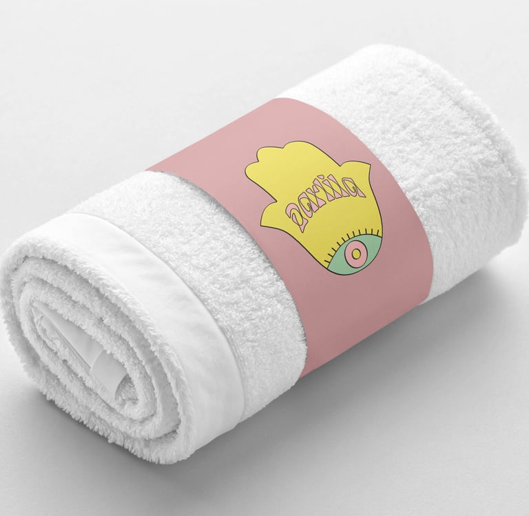 serviette de bain avec fourreau en carton personnalisé du logo Darlila.