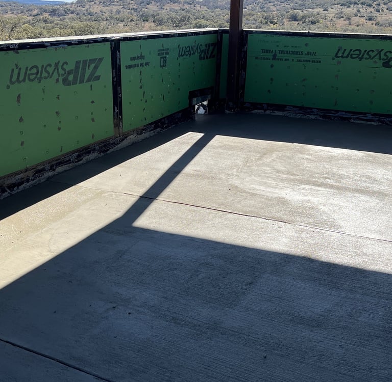 Balcony with poured concrete after being waterproofed.