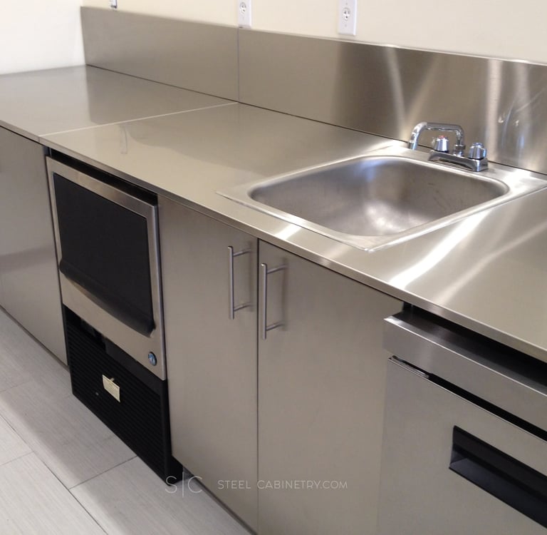 Stainless steel cabinets, countertop and back splash