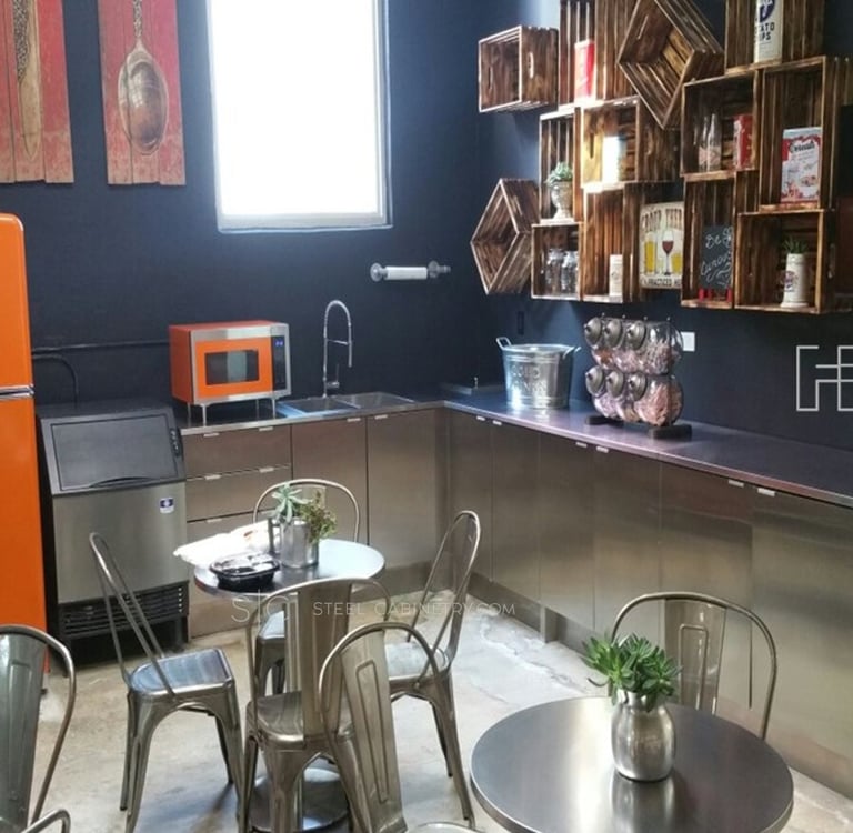 Modern commercial kitchen with stainless steel cabinetry