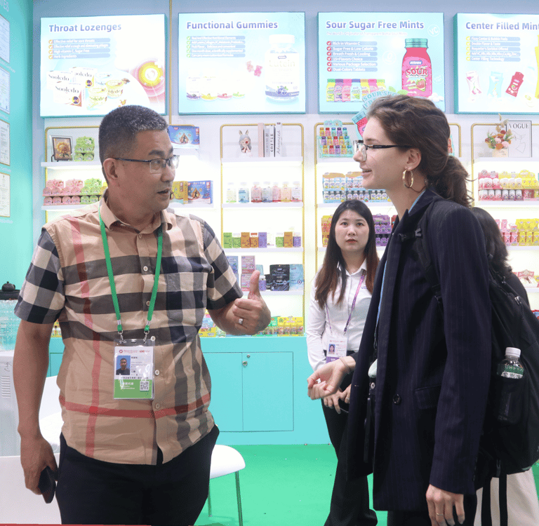 Product sourcing agency connecting global buyers with Chinese nutraceutical suppliers at a Chinese trade show