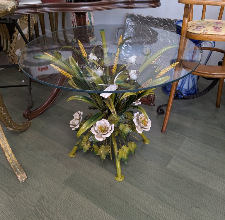 glass table with floral base