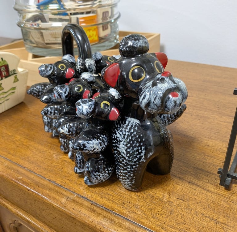 Vintage ceramic black poodle spice holder.