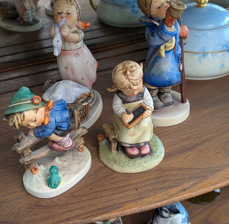 Goebel Hummel porcelain figurines.