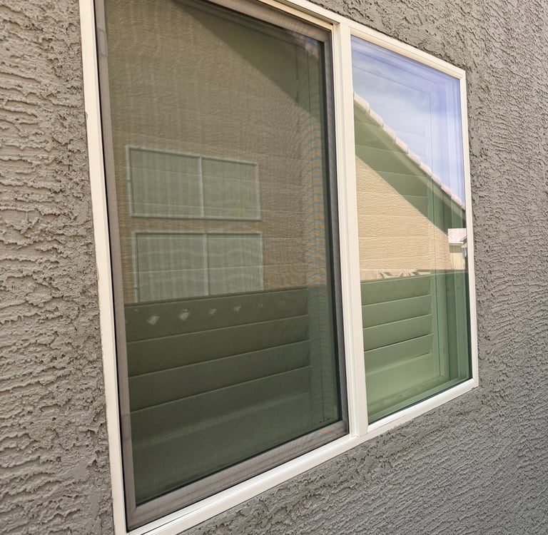 A window lacking a window screen and the privacy it provides