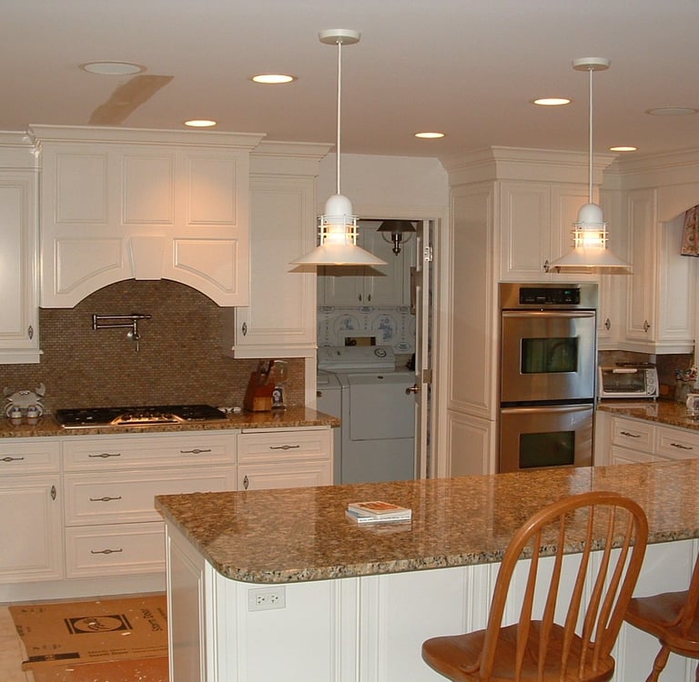 Open kitchen remodel with island and updated cabinets