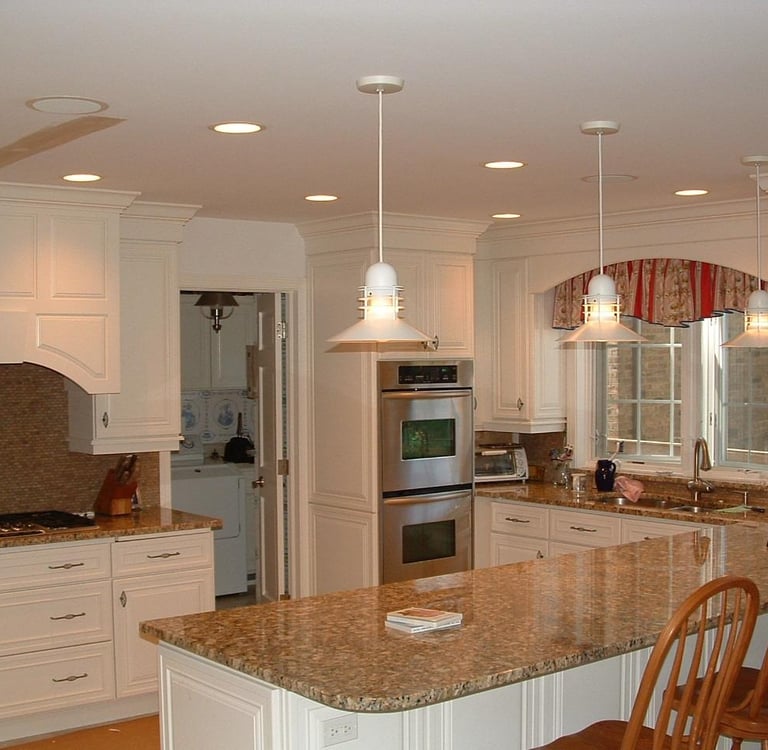 Custom white kitchen cabinet installation and design