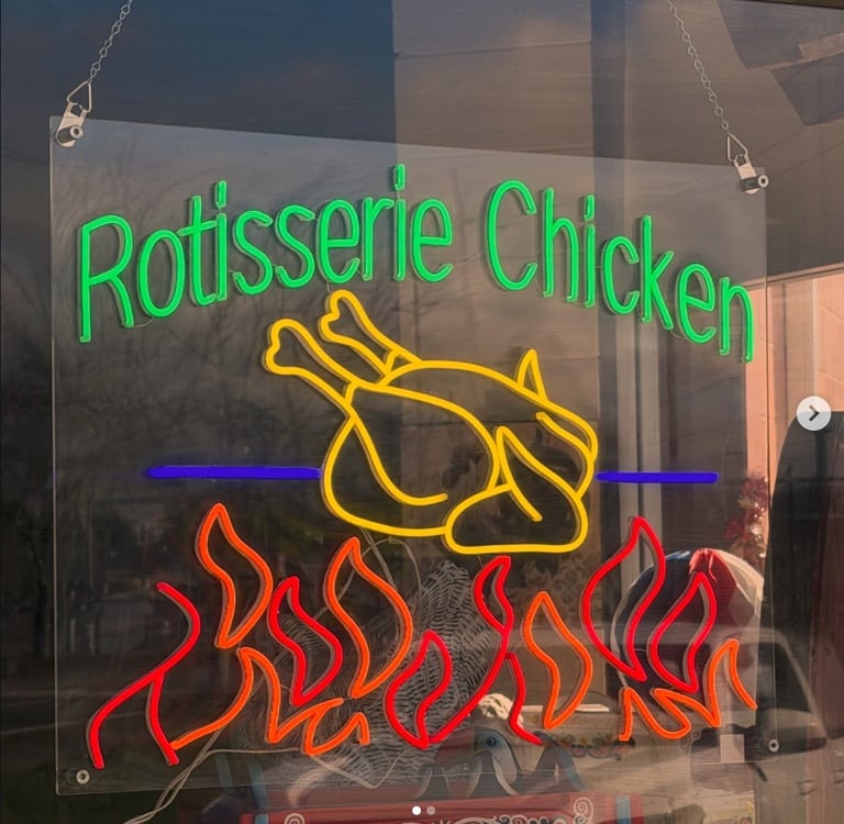 Las Brasas Rotisserie Chicken sign