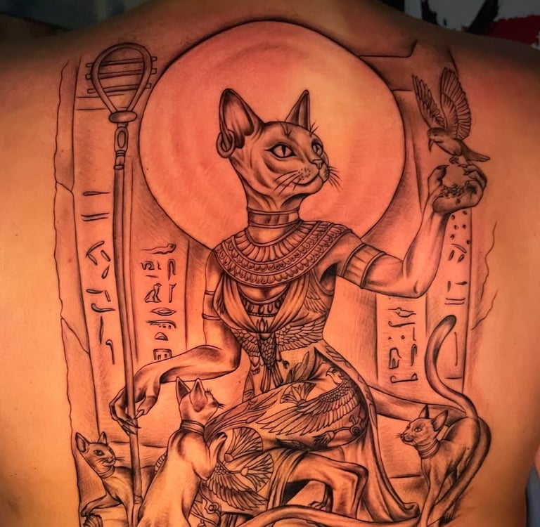 Large black and grey Egyptian Bastet cat goddess back tattoo  , Hurghada tattoo studio 